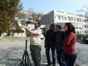 Participants from Albania, Nepal, Malawi and Italy testing an antenna with the RF Explorer Spectrum Analyzer in Trieste, February 2012