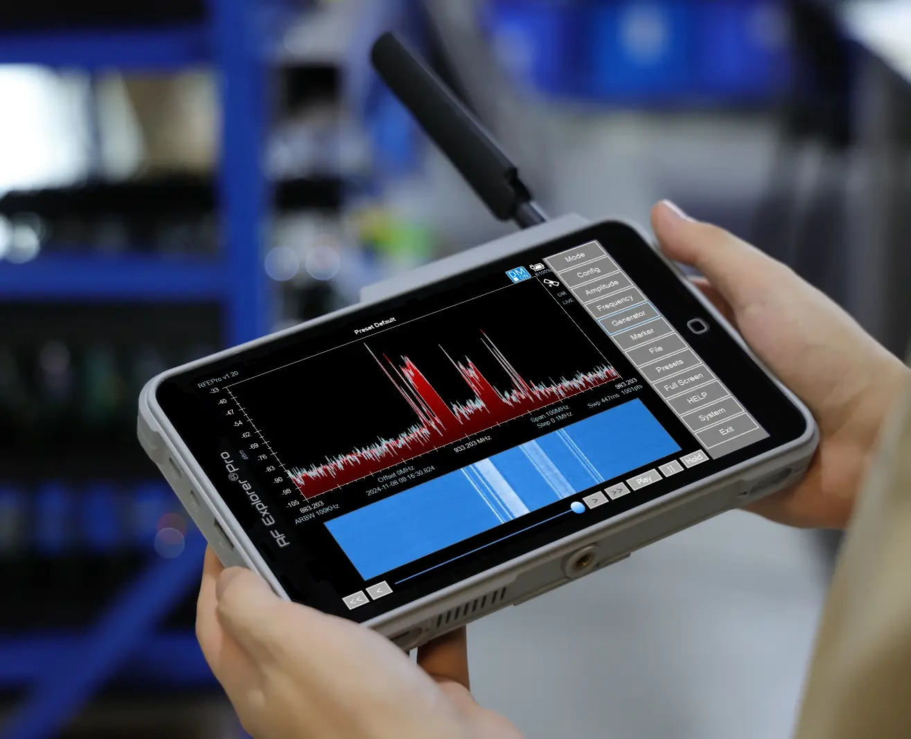 RF Explorer Spectrum Analyzer in Hand by operator